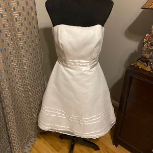 This is a white evening/prom dress David’s bridal